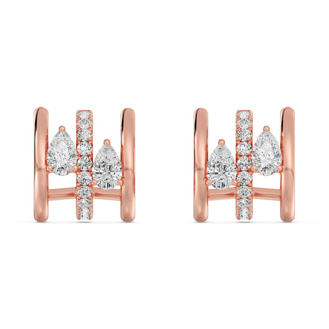 Rose Gold 18K Triple Hoop Huggie Earrings embellished with lab-grown pear and round-cut diamonds, showcasing a warm and elegant finish with a secure closure