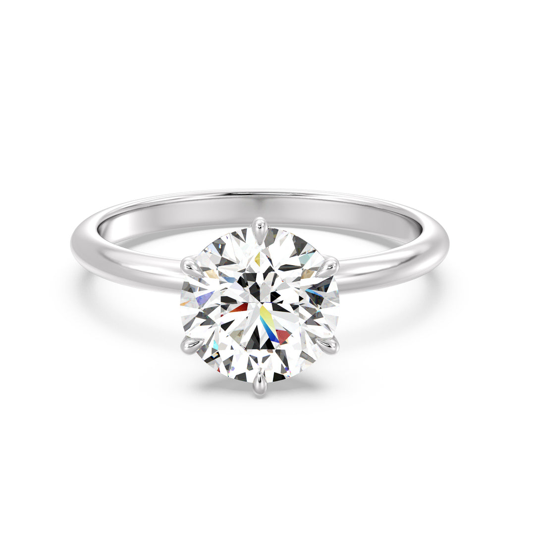 Modern 6-Prong Round Lab-Grown Diamond Solitaire Engagement Ring in 18K White Gold with a dazzling EF color VS clarity diamond secured in an open basket design