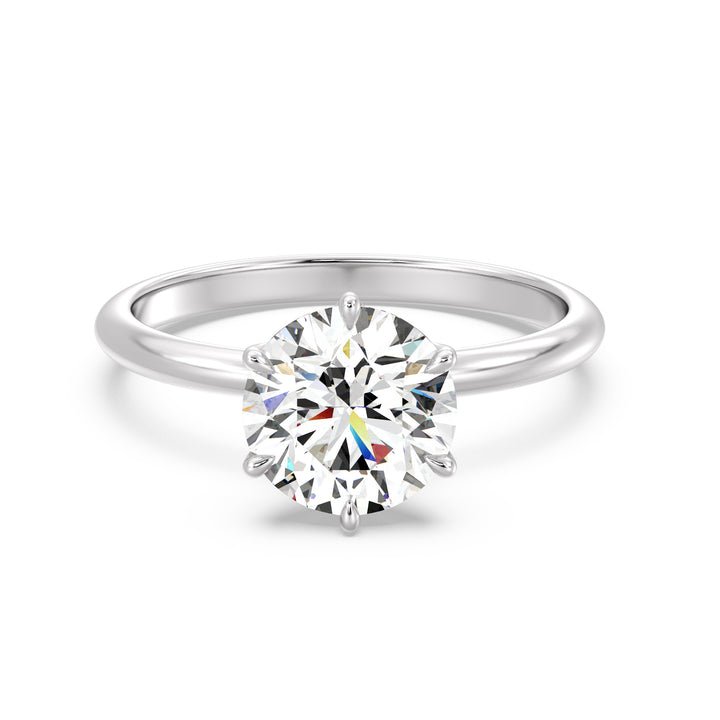Modern 6-Prong Round Lab-Grown Diamond Solitaire Engagement Ring in 18K White Gold with a dazzling EF color VS clarity diamond secured in an open basket design