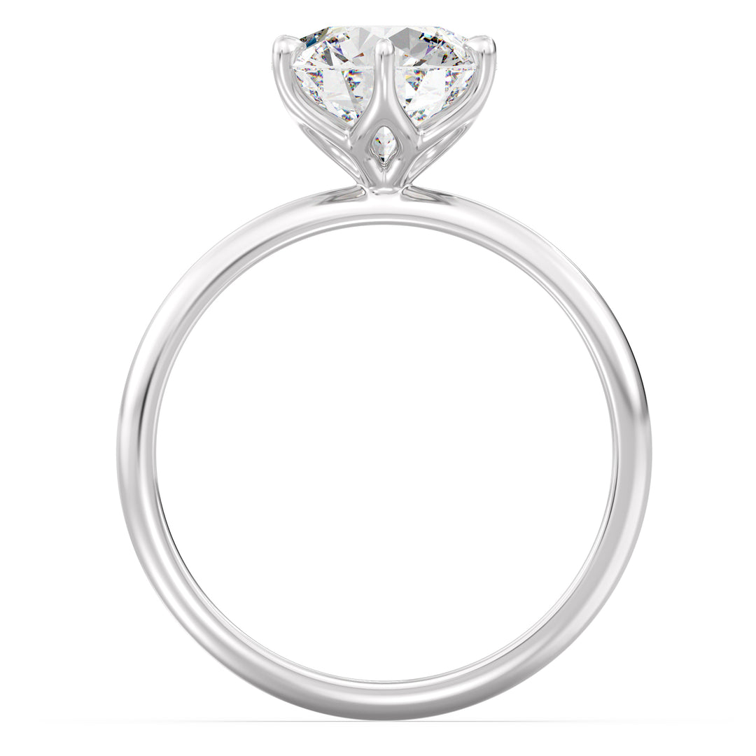 Modern 6-Prong Round Lab-Grown Diamond Solitaire Engagement Ring in 18K White Gold with a dazzling EF color VS clarity diamond secured in an open basket design