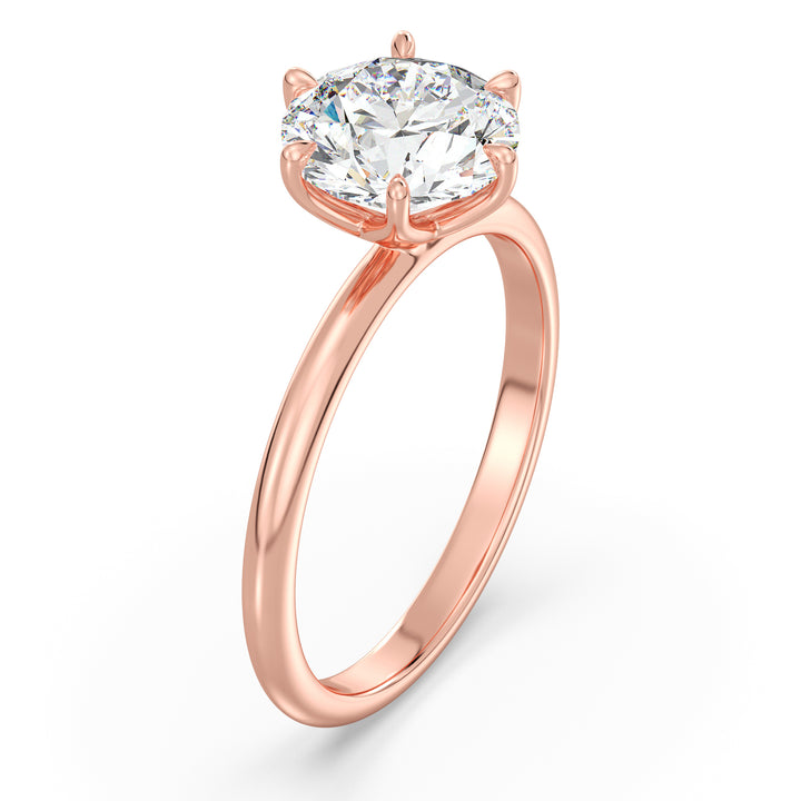 Elegant 6-Prong Round Lab-Grown Diamond Solitaire Engagement Ring in 18K Rose Gold showcasing a sparkling EF color VS clarity diamond in a romantic open basket setting