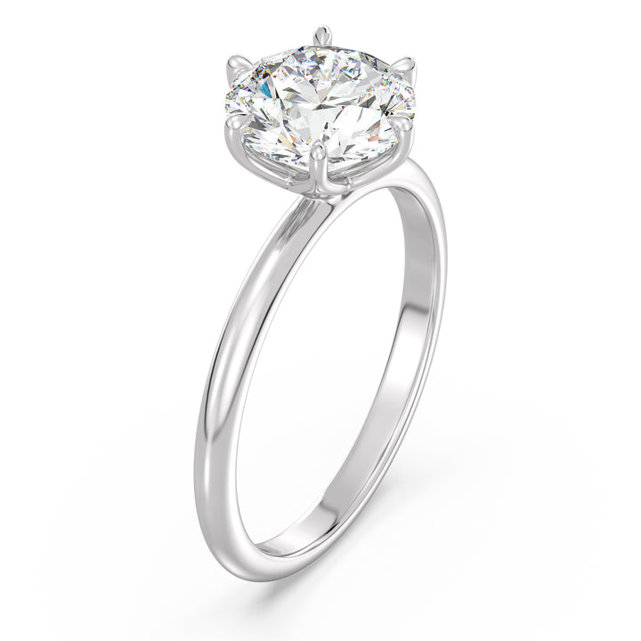 Modern 6-Prong Round Lab-Grown Diamond Solitaire Engagement Ring in 18K White Gold with a dazzling EF color VS clarity diamond secured in an open basket design